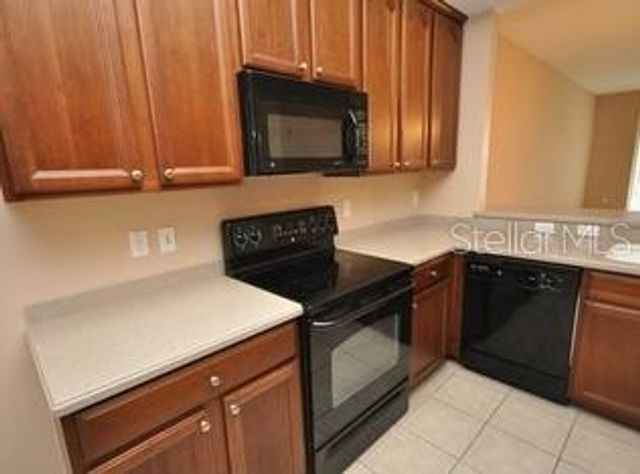 9441 MYRTLE CREEK LANE 215, Orlando, FL 32832