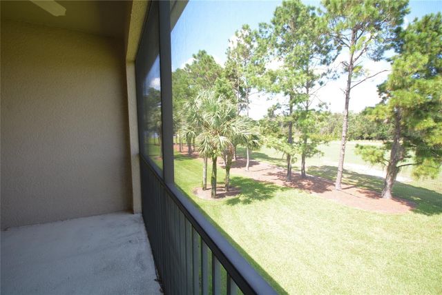 9441 MYRTLE CREEK LANE 215, Orlando, FL 32832