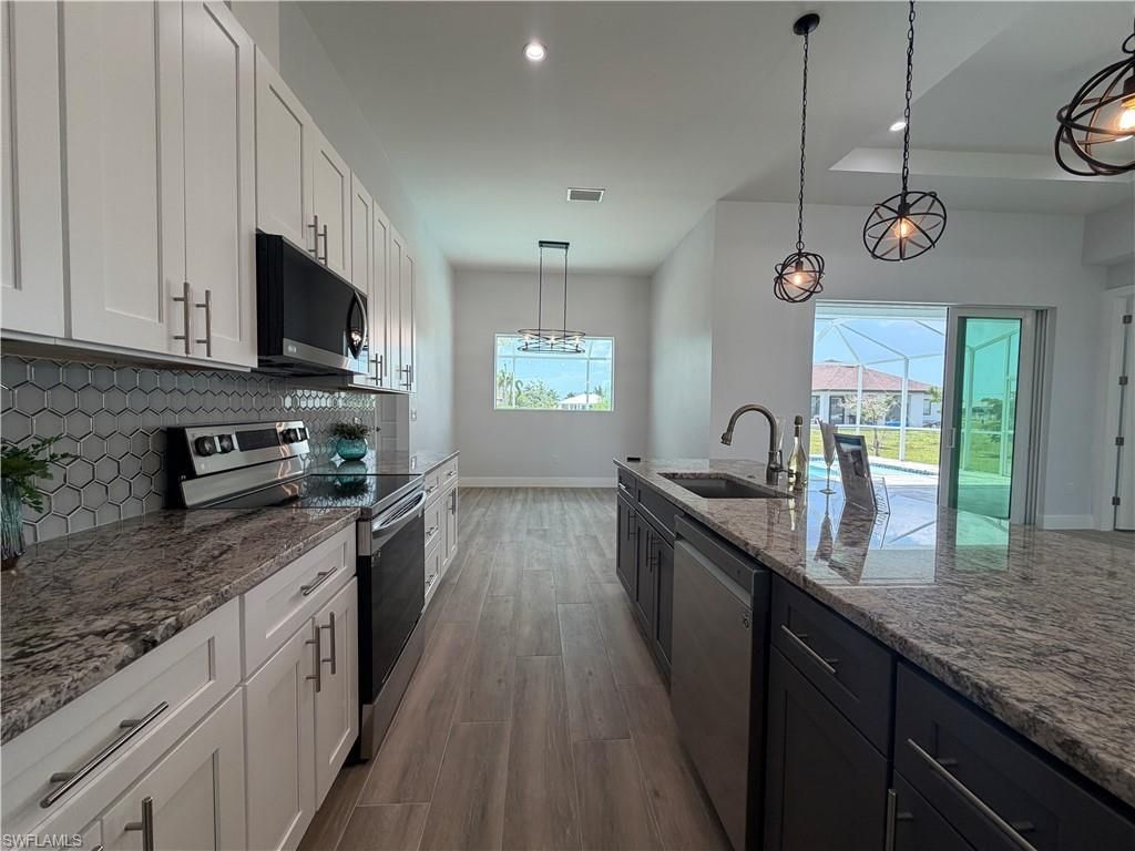 4338 NW 31st TER, CAPE CORAL, FL 33993 — photo 4