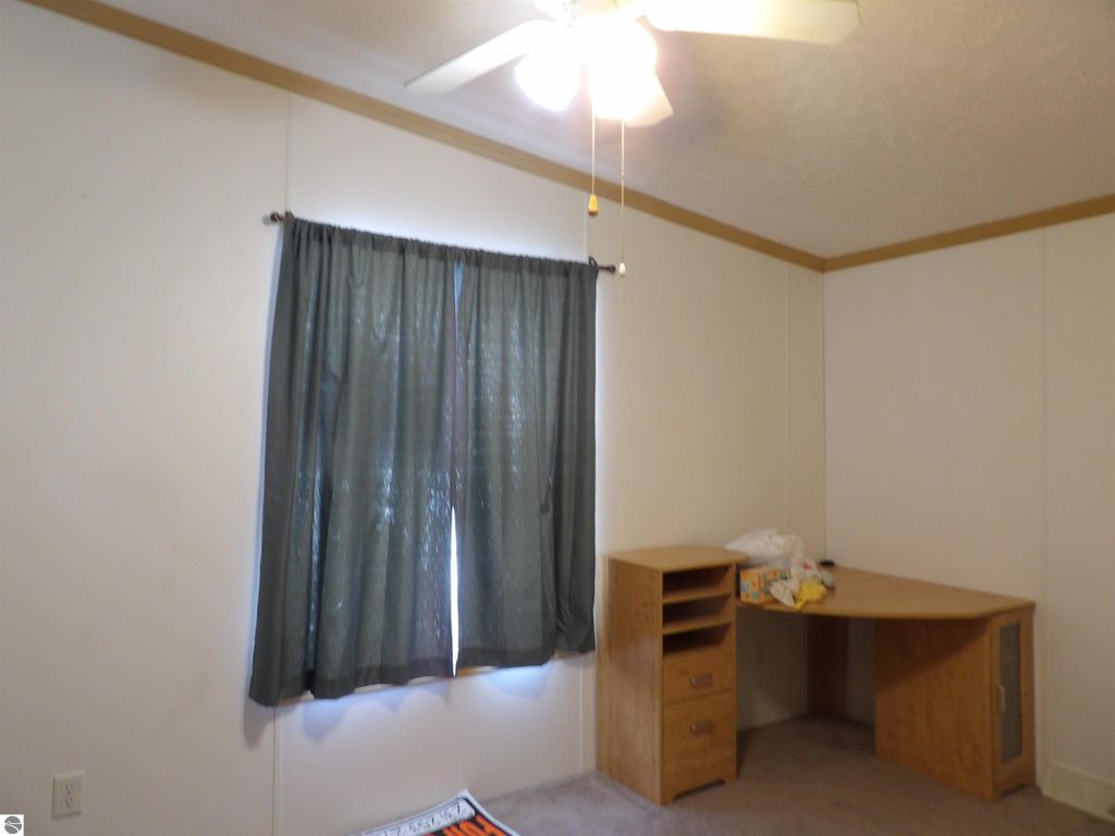 Image 13 of property listing at 388 Fairway Drive, Cadillac, MI 49601