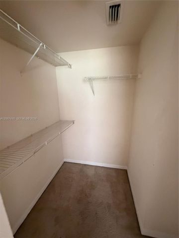 6492 Emerald Dunes Drive 107, West Palm Beach, FL 33411