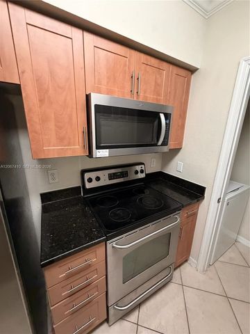 6492 Emerald Dunes Drive 107, West Palm Beach, FL 33411