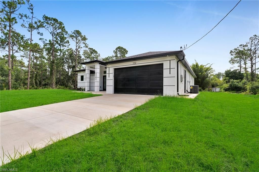102 Grant AVE, LEHIGH ACRES, FL 33936 — photo 2