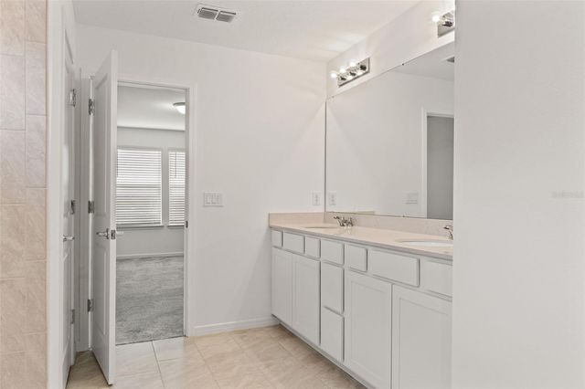 9058 RALLY SPRING LOOP, Wesley Chapel, FL 33545