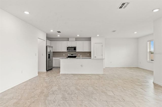 9058 RALLY SPRING LOOP, Wesley Chapel, FL 33545