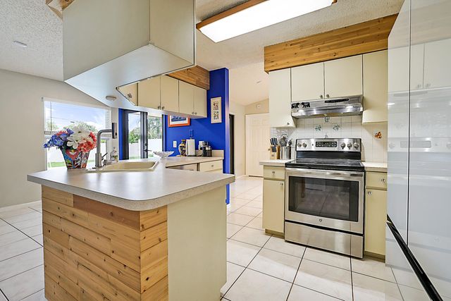 7597 N Nemec Dr Drive N, Lake Clarke Shores, FL 33406