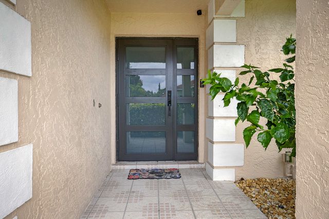 7597 N Nemec Dr Drive N, Lake Clarke Shores, FL 33406