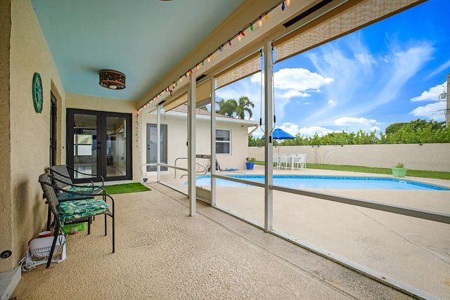 7597 N Nemec Dr Drive N, Lake Clarke Shores, FL 33406