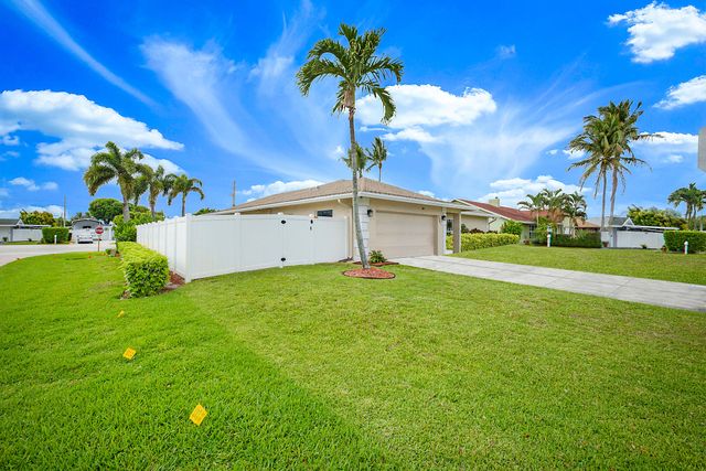 7597 N Nemec Dr Drive N, Lake Clarke Shores, FL 33406