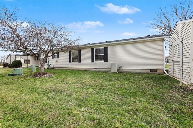 1002 NE White Oaks Lane, Oak Grove, MO 64075