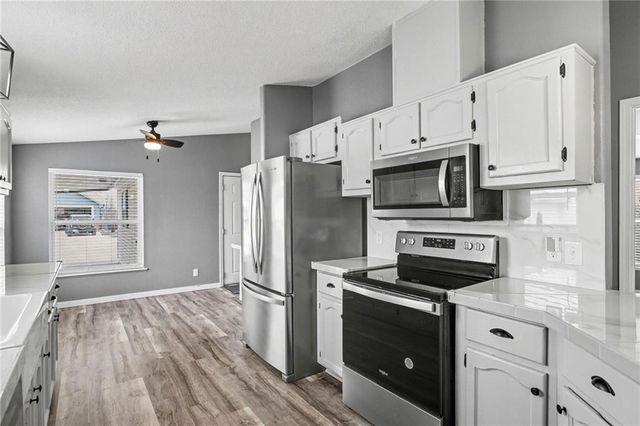 1002 NE White Oaks Lane, Oak Grove, MO 64075