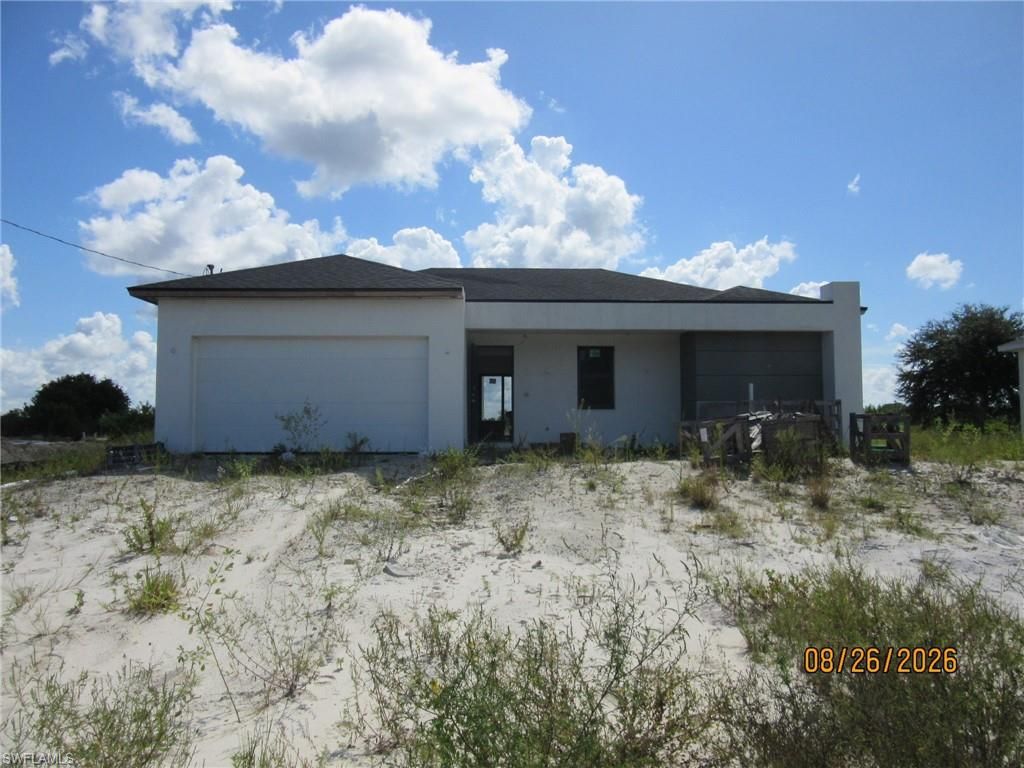 335 Rawlings AVE, LEHIGH ACRES, FL 33974 — exterior