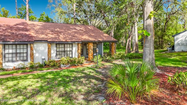2077 Woodcutter Court, Spring Hill, FL 34606