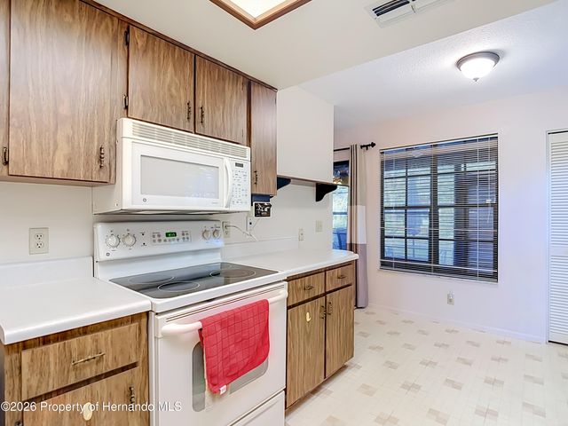 2077 Woodcutter Court, Spring Hill, FL 34606