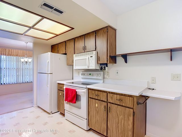 2077 Woodcutter Court, Spring Hill, FL 34606