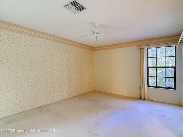 2077 Woodcutter Court, Spring Hill, FL 34606