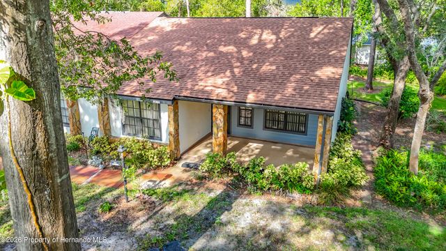 2077 Woodcutter Court, Spring Hill, FL 34606