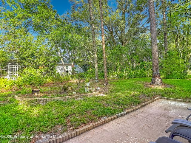 2077 Woodcutter Court, Spring Hill, FL 34606