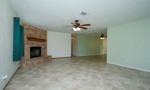 6867 Stillwater Drive, Willis, TX 77318