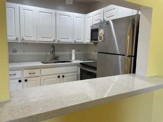 2960 Lake Osborne Drive 107, Lake Worth Beach, FL 33461