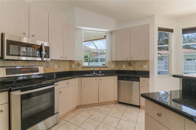 10256 NW 53rd Ct, Coral Springs, FL 33076