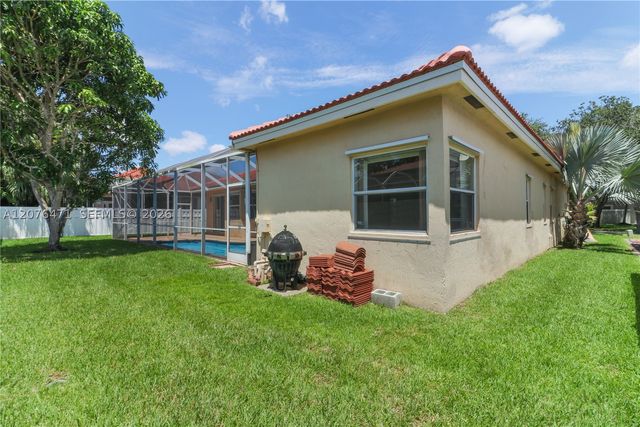 10256 NW 53rd Ct, Coral Springs, FL 33076