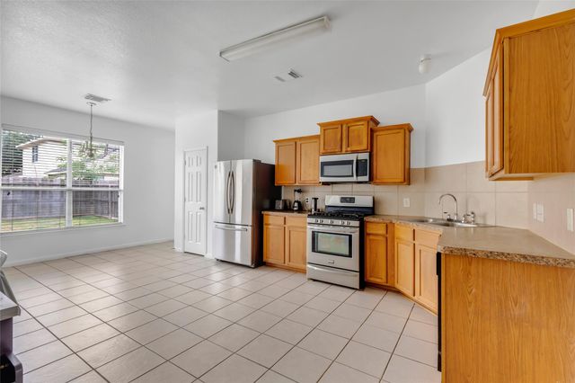 15835 Flagstone Walk Way, Houston, TX 77049