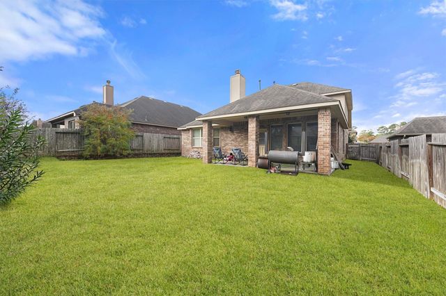111 Quail Meadow Drive, Conroe, TX 77384