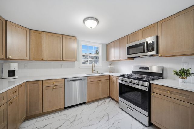 57 Corbett St, Lowell, MA 01852