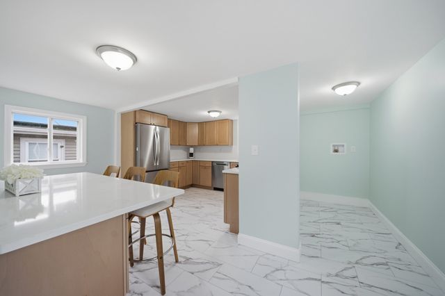 57 Corbett St, Lowell, MA 01852