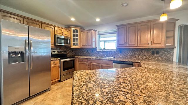 1141 Scarborough Dr, Davie, FL 33324