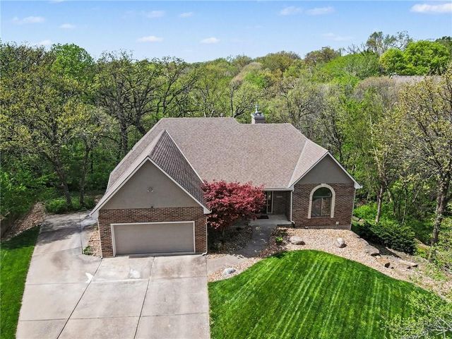 2401 SW Whispering Creek Court, Blue Springs, MO 64015