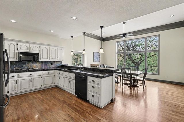 2401 SW Whispering Creek Court, Blue Springs, MO 64015