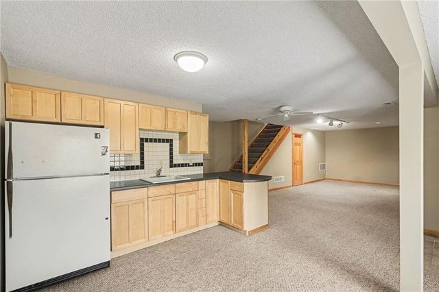 2401 SW Whispering Creek Court, Blue Springs, MO 64015