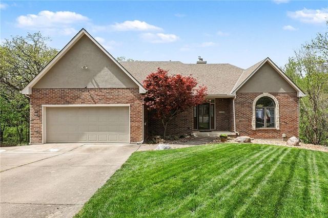 2401 SW Whispering Creek Court, Blue Springs, MO 64015