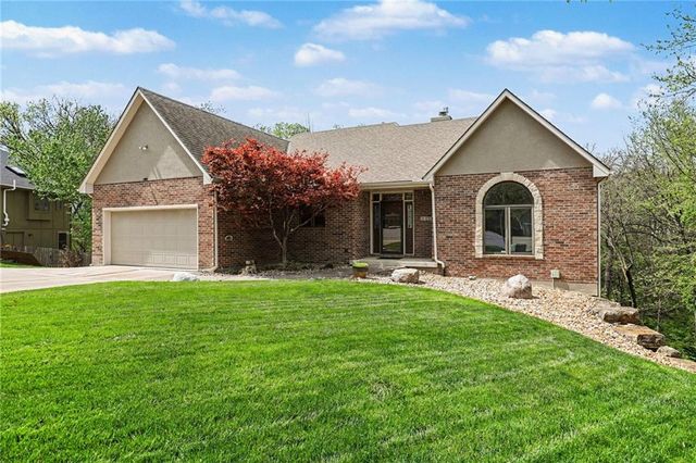 2401 SW Whispering Creek Court, Blue Springs, MO 64015