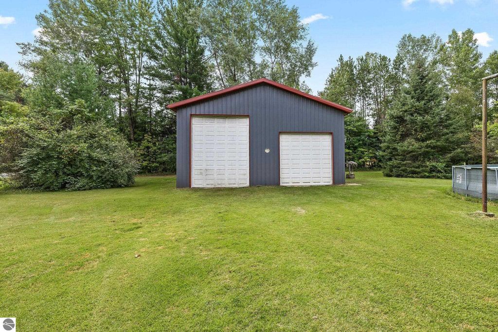Image 50 of property listing at 4812 SE County Line Road, Shepherd, MI 48883