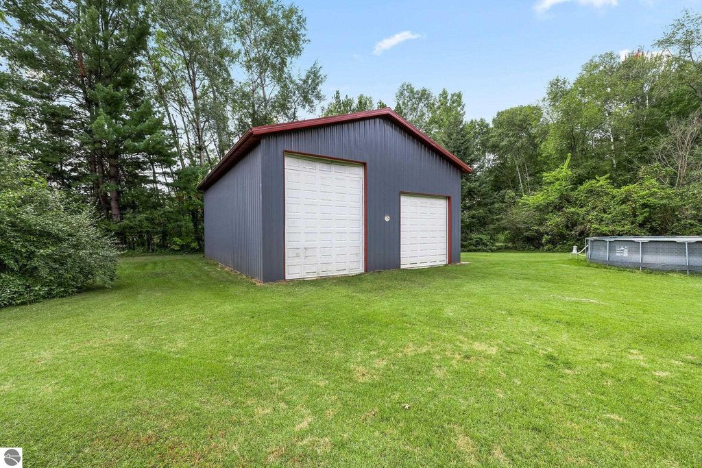 Image 51 of property listing at 4812 SE County Line Road, Shepherd, MI 48883