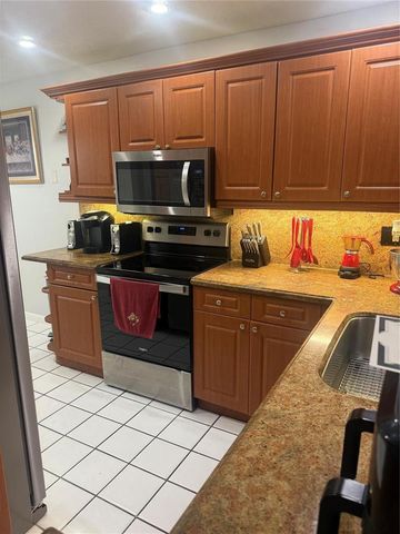 7081 Woodmont Way, Tamarac, FL 33321