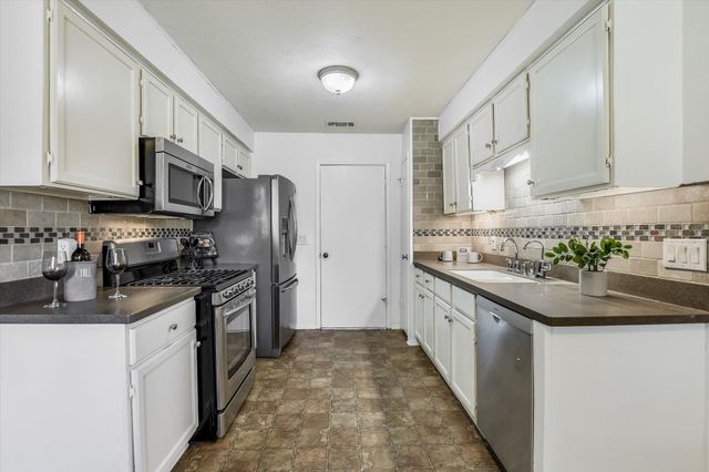 10104 Woodland Village DR, Austin, TX 78750