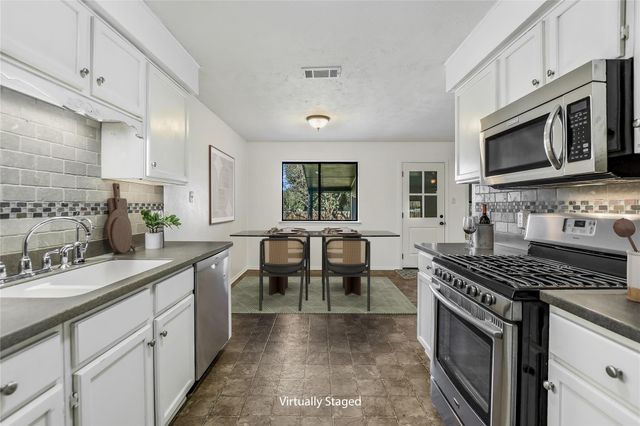 10104 Woodland Village DR, Austin, TX 78750