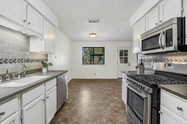 10104 Woodland Village DR, Austin, TX 78750