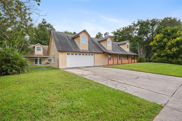 10102 FLOWERS AVENUE, Orlando, FL 32825