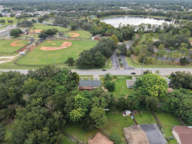 10102 FLOWERS AVENUE, Orlando, FL 32825