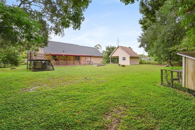 10102 FLOWERS AVENUE, Orlando, FL 32825