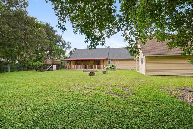 10102 FLOWERS AVENUE, Orlando, FL 32825