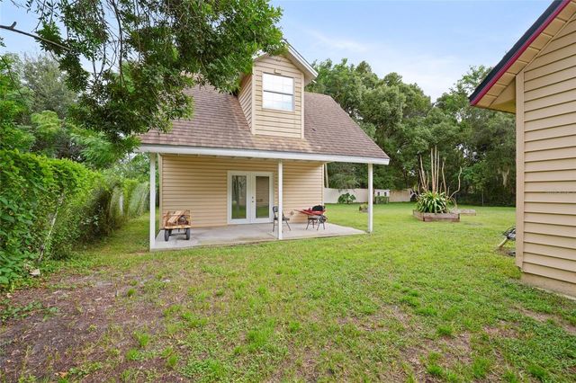 10102 FLOWERS AVENUE, Orlando, FL 32825