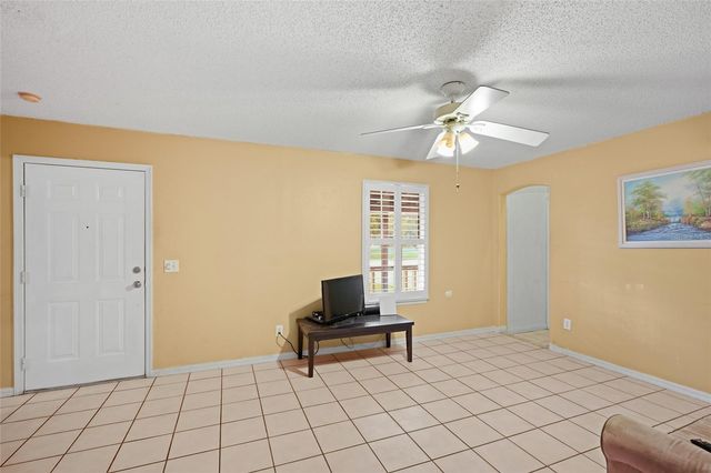 10102 FLOWERS AVENUE, Orlando, FL 32825