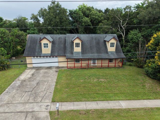 10102 FLOWERS AVENUE, Orlando, FL 32825