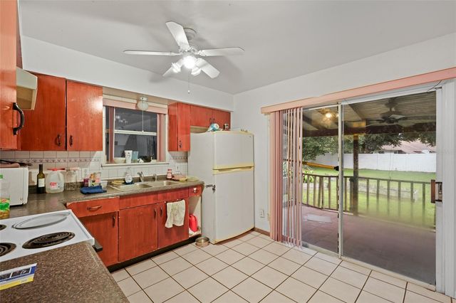 10102 FLOWERS AVENUE, Orlando, FL 32825